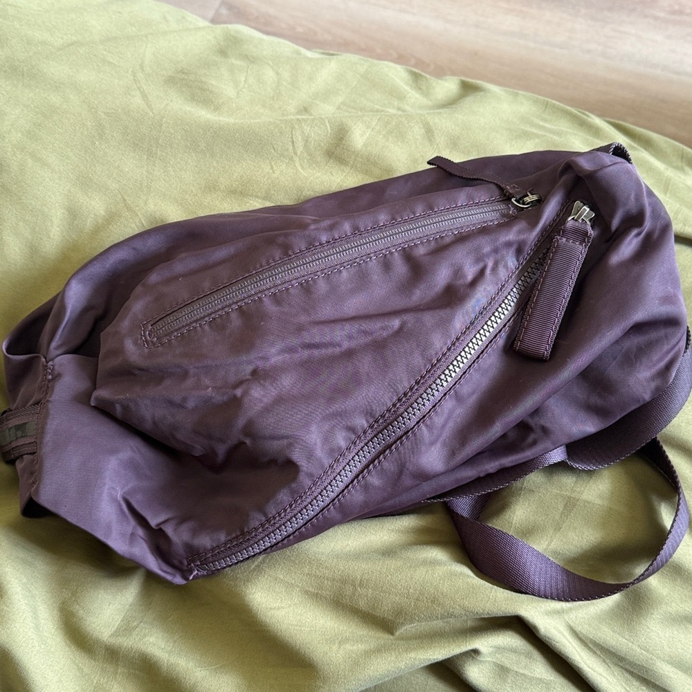Lululemon purple Fast Track original Sling Bag